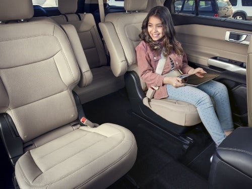 2024 Ford Explorer view of back seats with young girl sitting in middle row