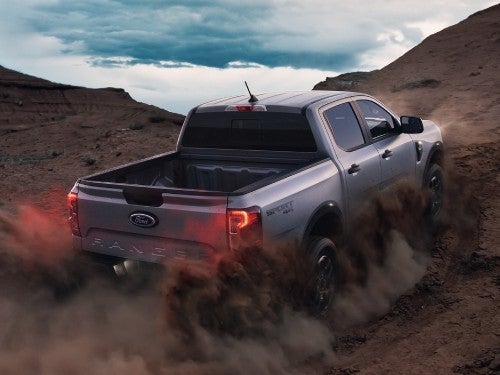2024 Ford Ranger offroading up a sandy hill
